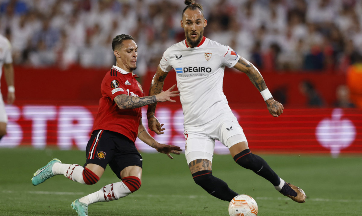Manchester United's Antony in action with Sevilla's Nemanja Gudelj during their Europa League match. (Reuters)