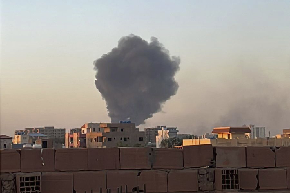 British officials were setting up an emergency operation to extricate several hundred people trapped in the north African country following the outbreak of hostilities. (AP)