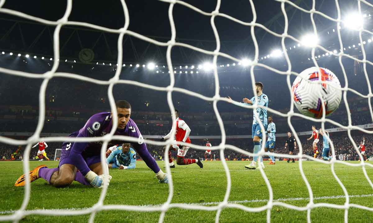 Arsenal's Bukayo Saka scores their third goal past Southampton's Gavin Bazunu during the Premier League match Friday at the Emirates Stadium, London. (Reuters)