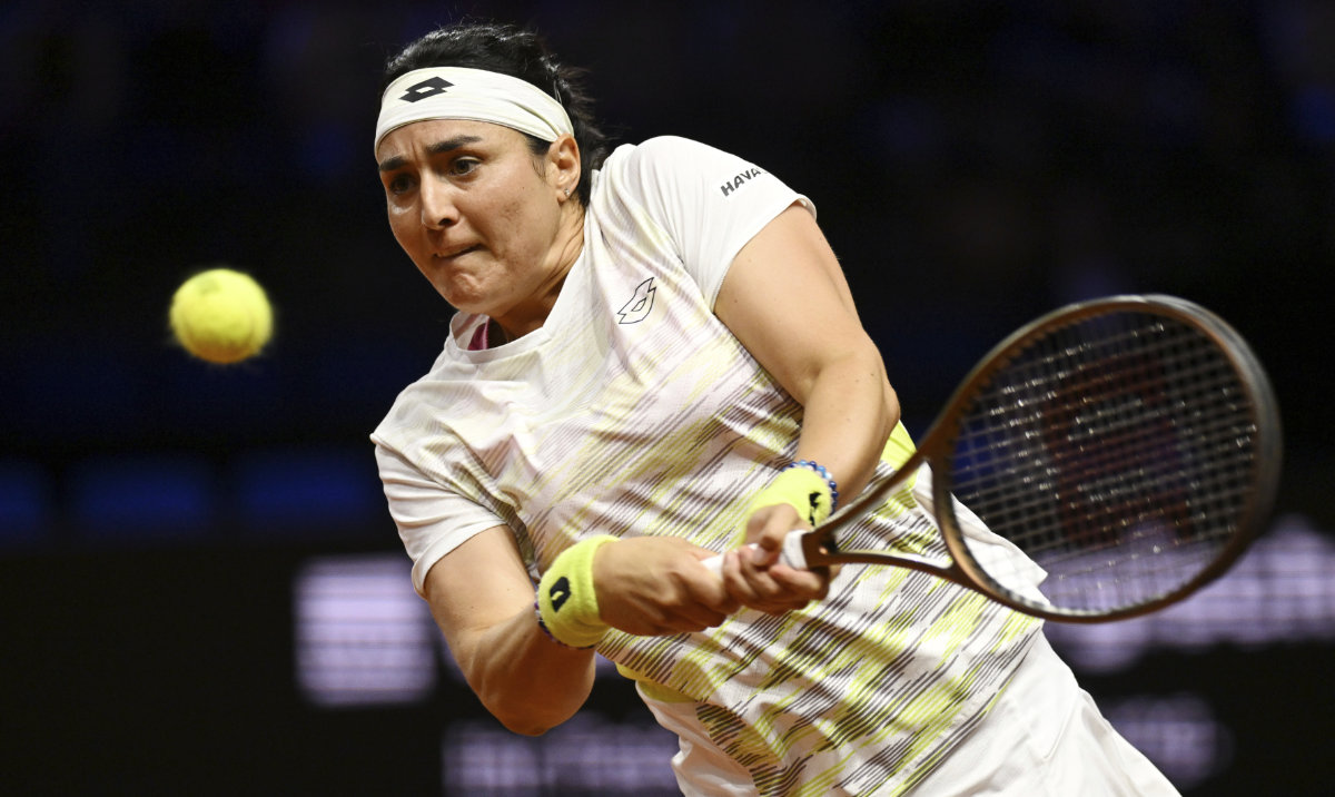 Tunisia's Ons Jabeur returns the ball to Brazil's Haddad Maia during their quarterfinals match at the Porsche Arena, in Stuttgart, Germany, Friday. (AP)
