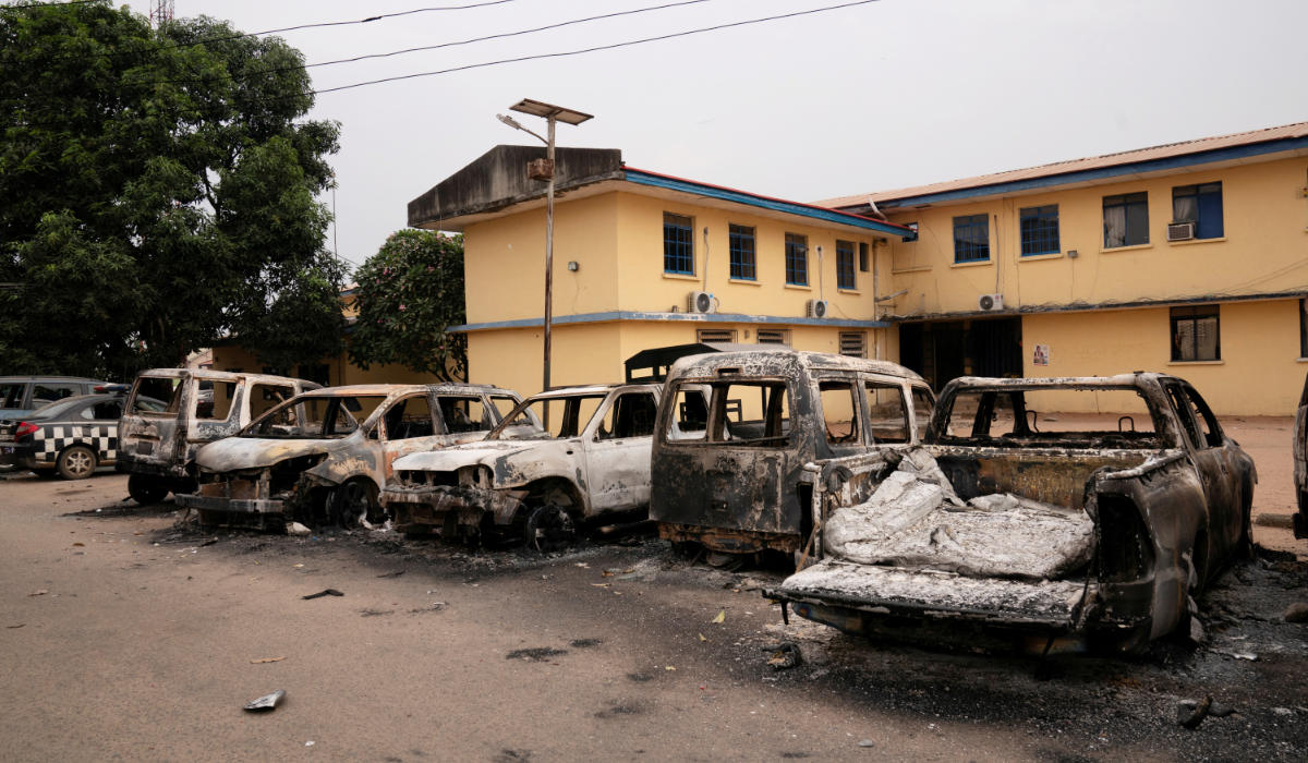 Burnt vehicles are seen outside the Nigeria police force Imo state command headquaters after gunmen attacked and set properties ablaze in Imo State, Nigeria April 5, 2021. Picture taken April 5, 2021. (REUTERS)