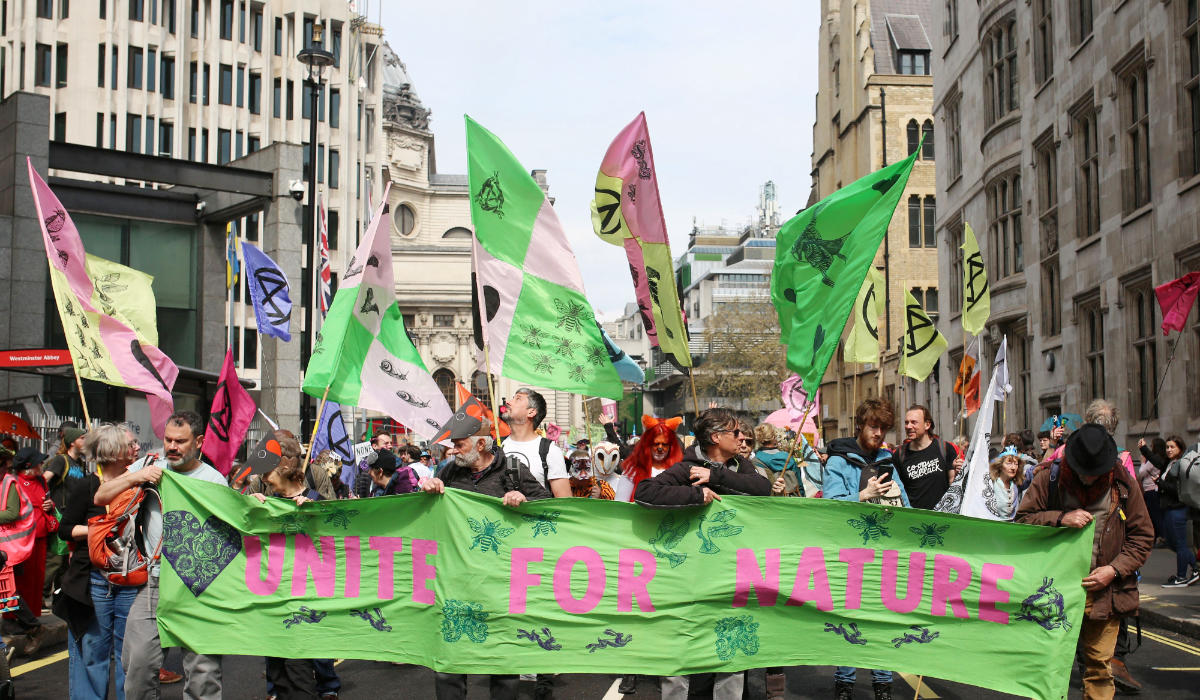 Protesters take part in a demonstration march by the climate change protest group Extinction Rebellion in London on Saturday. (AFP)