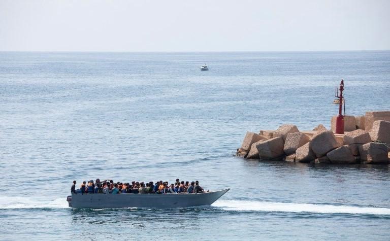 Migrants arrive at Lampedusa island, Italy. (AP Photo)