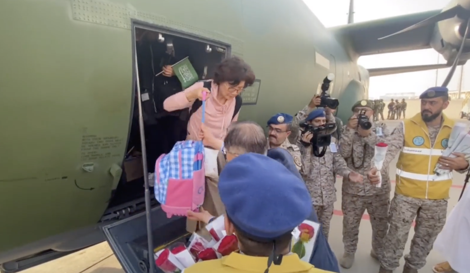South Korean citizens are greeted on arrival in the Kingdom with roses and sweets. (Screenshot)