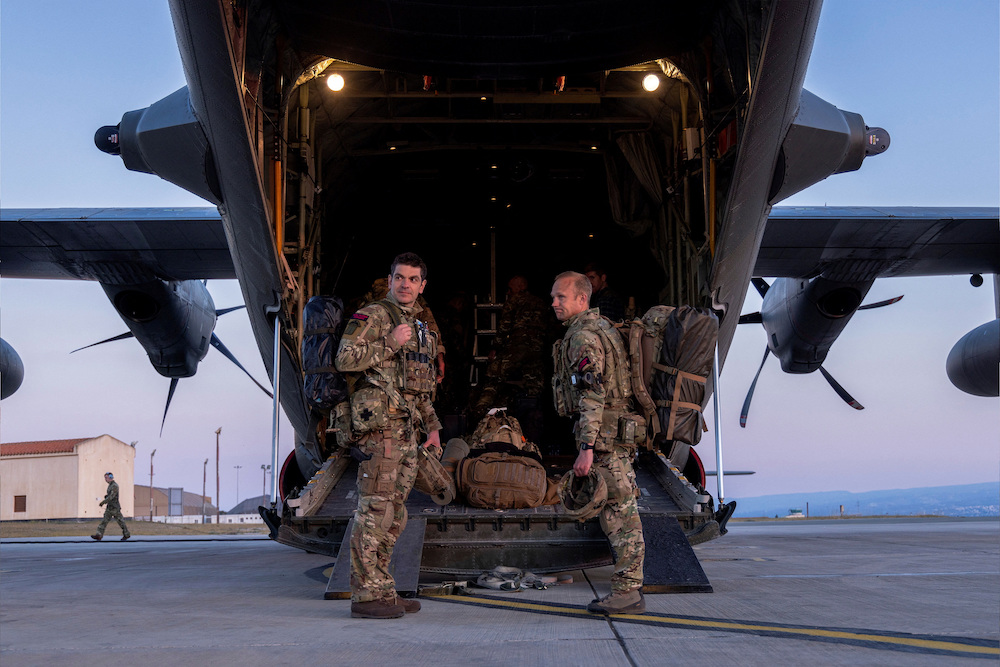 Lieutenant Colonel Oliver Denning and Duncan Maddocks RSM 40 Commando board the C-130 bound for Sudan to evacuate British embassy diplomats and their families in RAF Akrotiri, Cyprus on April 25, 2023. (Reuters)