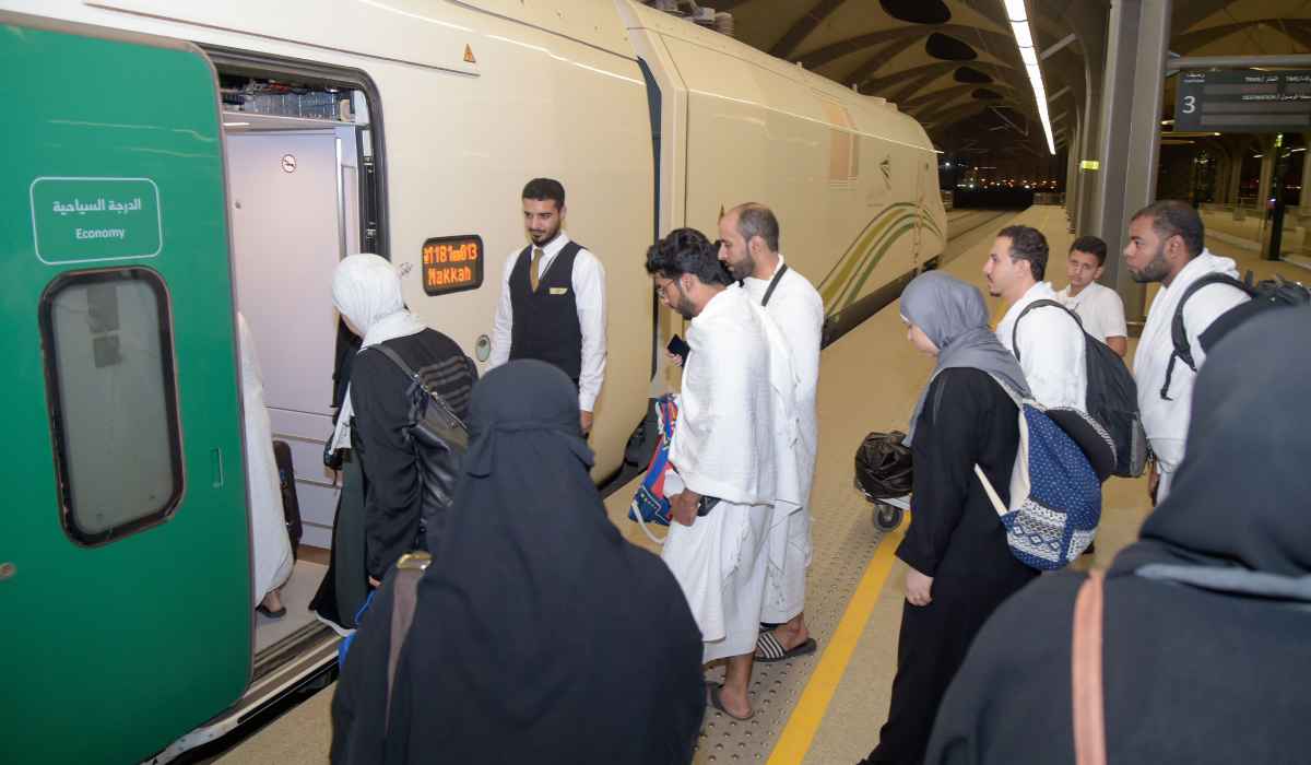 Muslim pilgrims are seen boarding a train at Makkah's train station. (AFP)