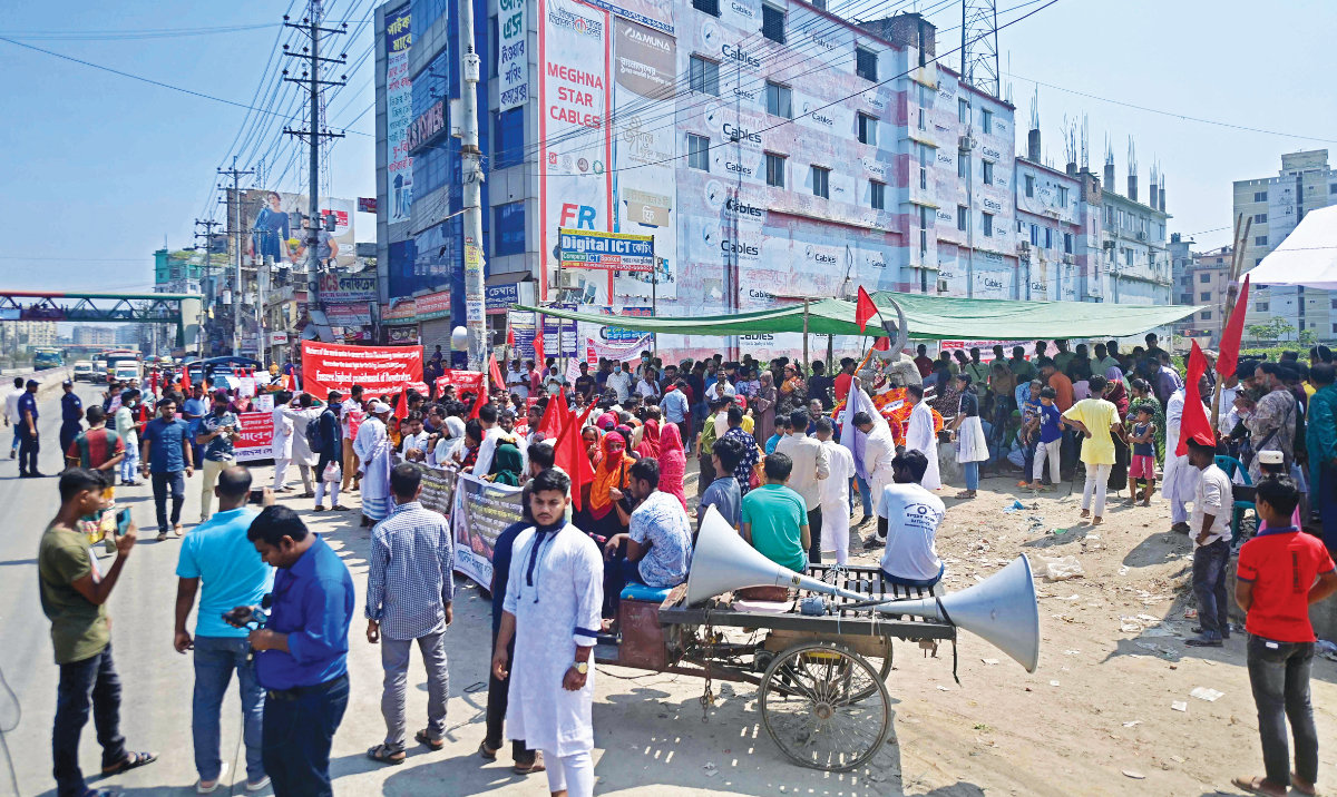 Victims of the Rana Plaza garments factory tragedy take part in a protest on its 10th anniversary at the site where the building once stood. (AFP)
