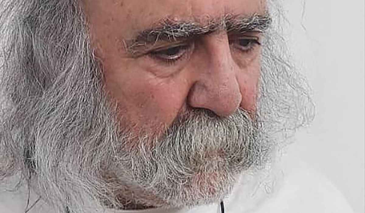 This family handout photo of Iranian dissident journalist Keyvan Samimi, 74, shows him after his release from prison on January 26, 2023 in Tehran. (AFP)