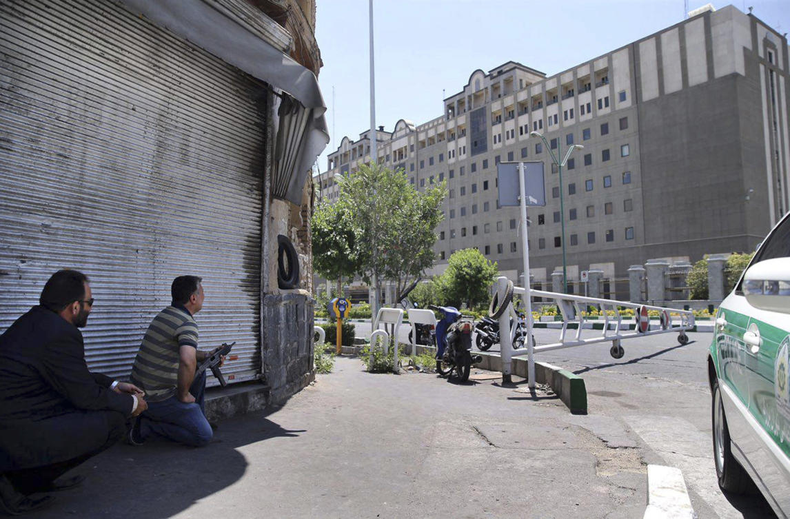 Security personnel take position in front of Iran’s parliament building in Tehran after an assault of several attackers on June 7, 2017. (Fars News Agency file photo via AP)