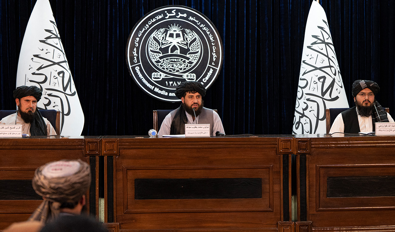 The army chief of staff Qari Fasihuddin Fitrat (L), acting defence minister of Afghanistan Mohammad Yaqoob Mujahid (C) and Taliban defence ministry spokesman Enayatullah Khawarizmi speak during a press conference in Kabul on August 28, 2022. (AFP/File)