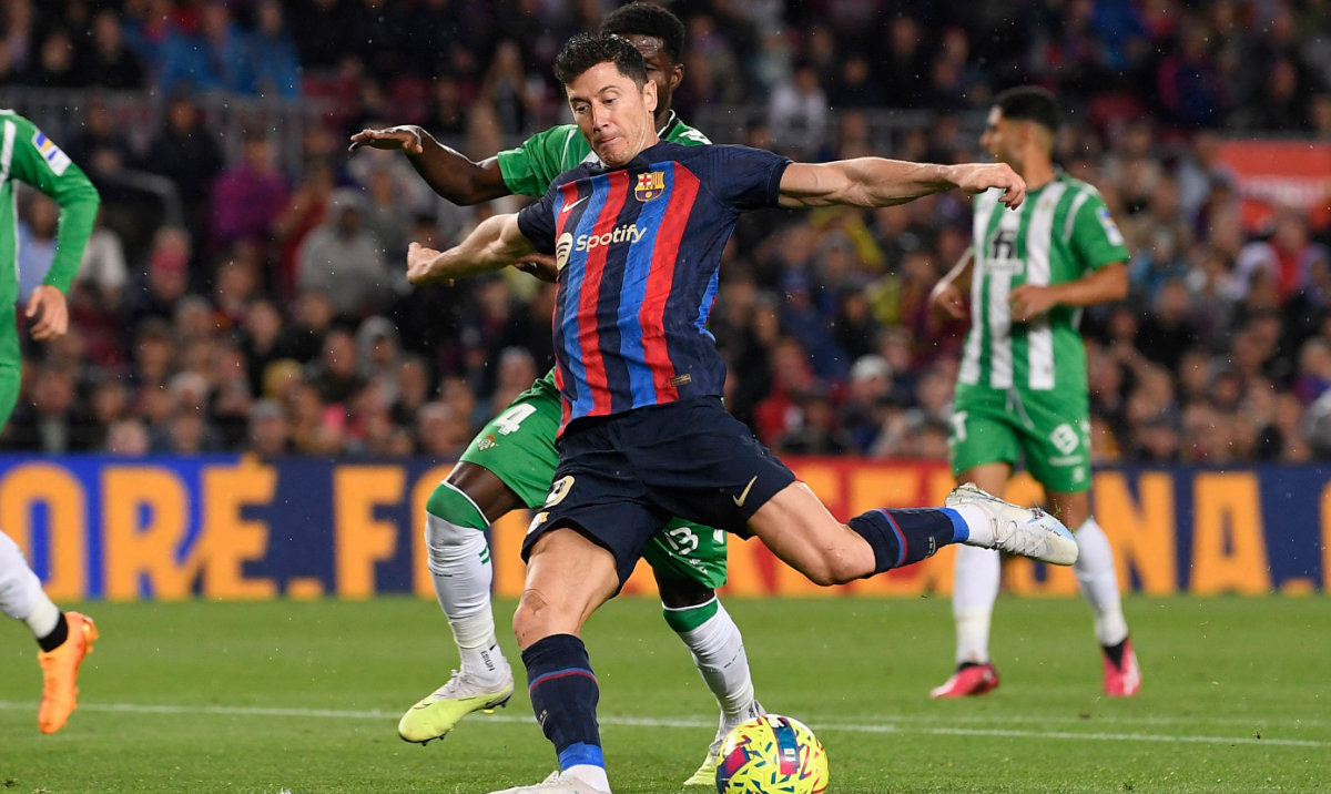 Barcelona's Polish forward Robert Lewandowski kicks the ball during the Spanish league football match between FC Barcelona and Real Betis at the Camp Nou stadium in Barcelona on April 29, 2023. (AFP)