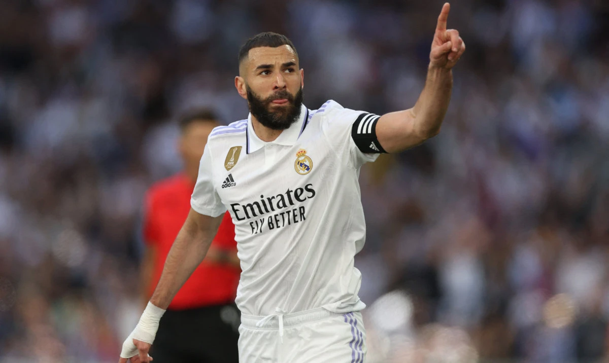 Real Madrid's French forward Karim Benzema celebrates scoring a goal during the Spanish league football match between Real Madrid CF and Real Valladolid FC at the Santiago Bernabeu stadium in Madrid on April 2, 2023. (AFP)