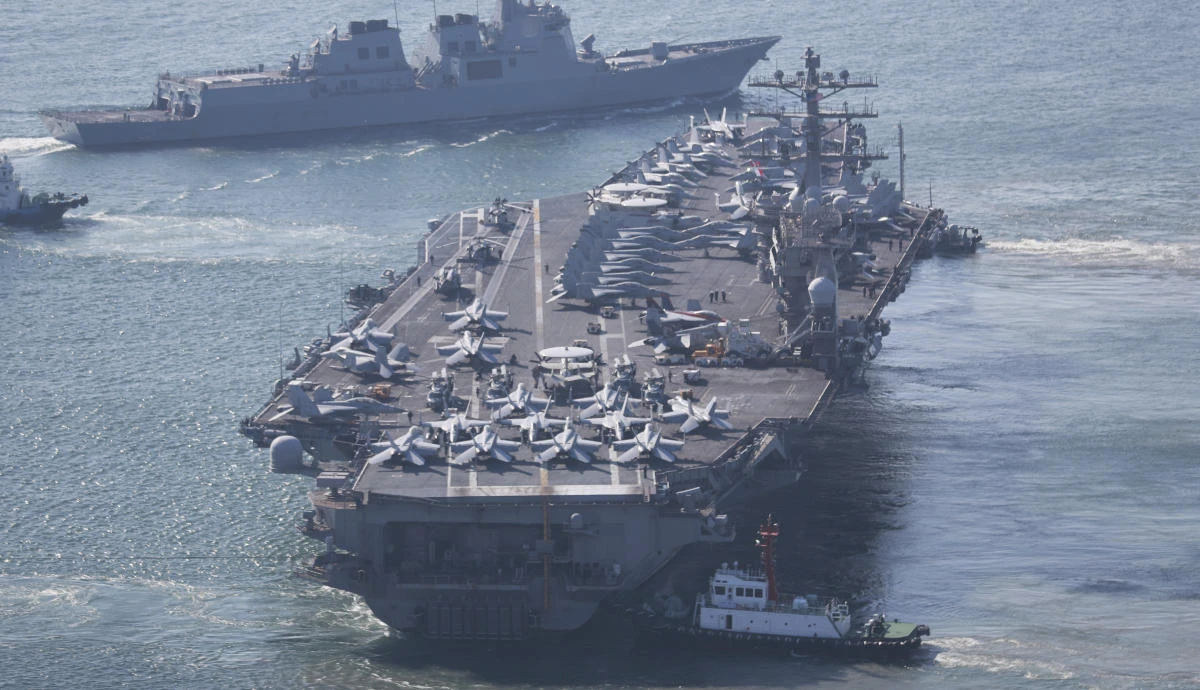 Above, the US Navy’s nuclear-powered aircraft carrier USS Nimitz, which is participating in joint maritime exercises, departs a naval base in Busan, South Korea on April 2, 2023. (Yonhap via AP)