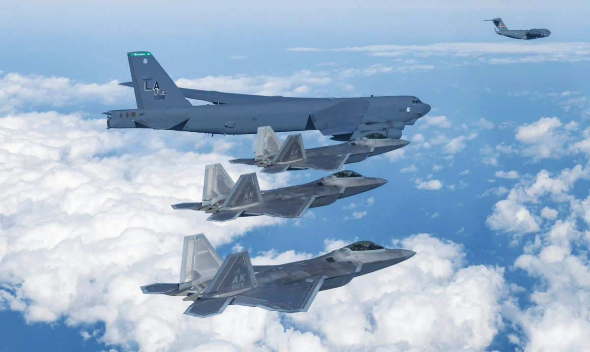 A B-52 bomber, C-17, and F-22 fighter jets fly over the Korean Peninsula during a joint air drill in South Korea in this Dec. 20, 2022 file photo. (AP)