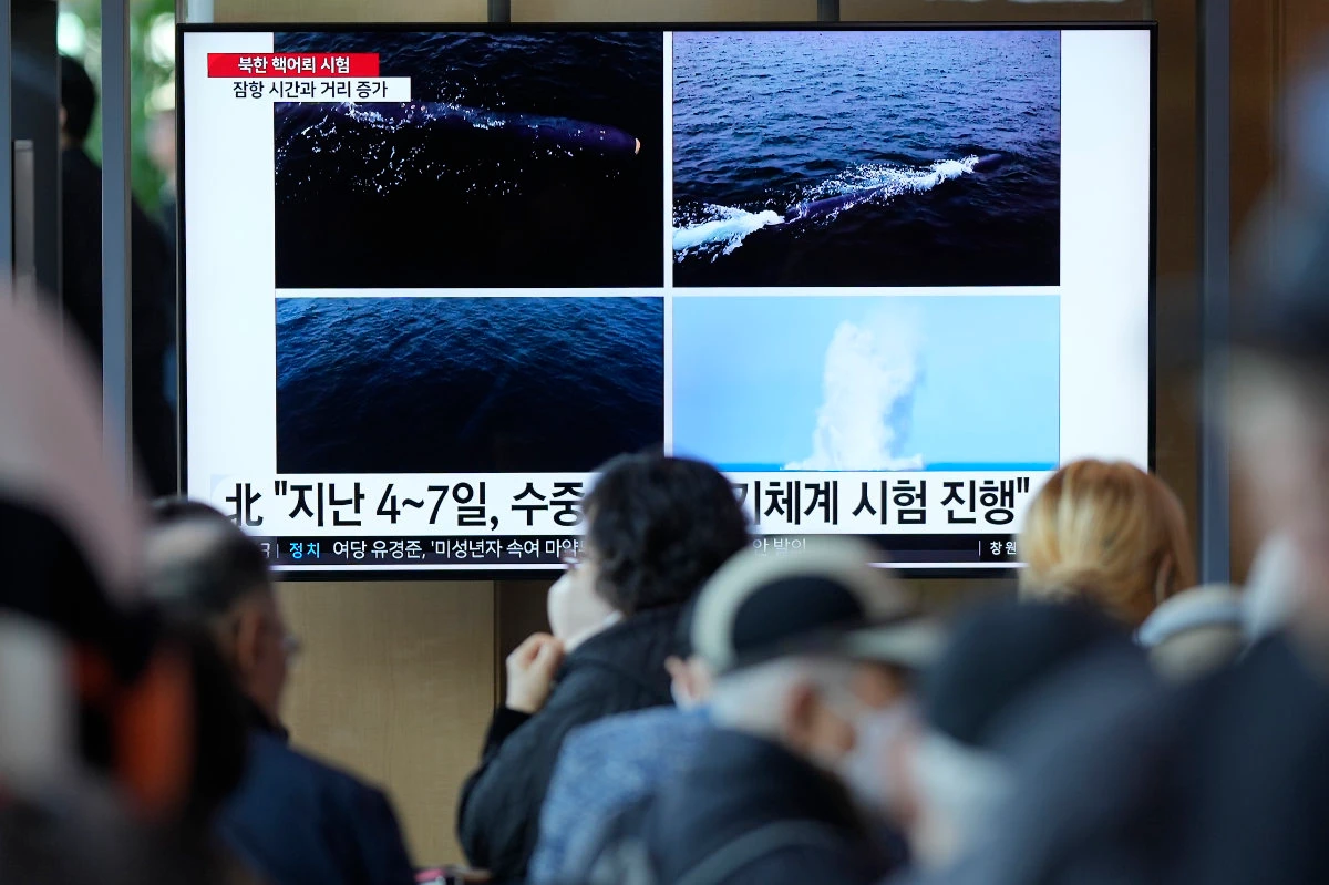 A combination of images on North Korea's weapons tests, released by Pyongyang's official Korean Central News Agency, are shown on a South Korean news broadcast in Seoul on April 8, 2023. (AP Photo/Lee Jin-man)