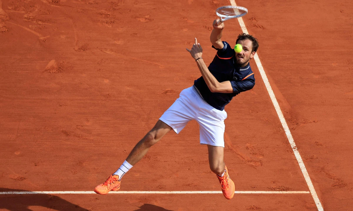 Russia's Daniil Medvedev plays a forehand return to Italy's Lorenzo Sonego during the Monte Carlo ATP Masters Series Tournament round of 32 tennis match at Monte Carlo on Wednesday. (AFP)