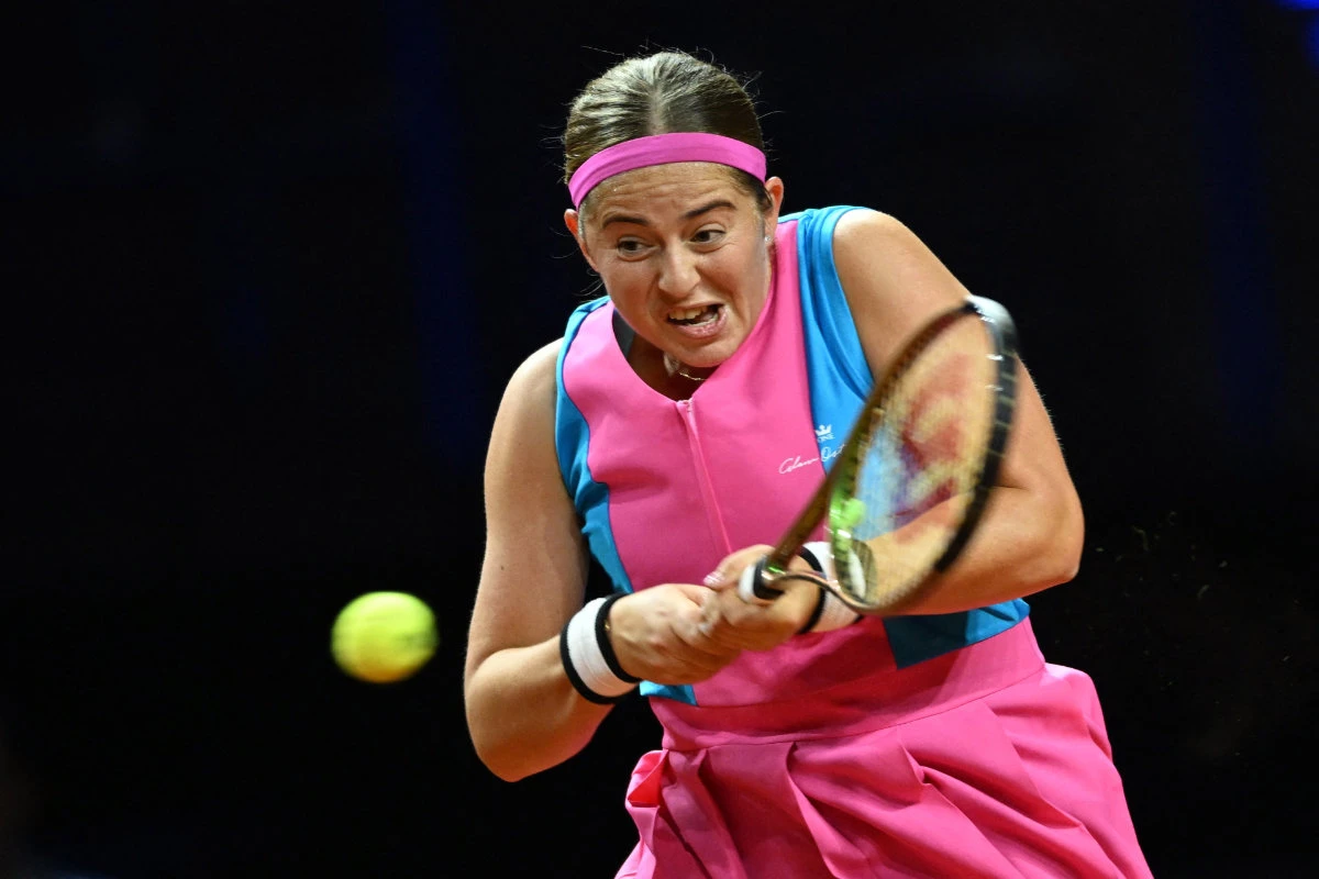 Latvia's Jelena Ostapenko in action during her round of 32 match against Britain's Emma Raducanu in the Stuttgart Open tennis tournament a Porsche Arena, Stuttgart, Germany, on Tuesday. (Reuters)
