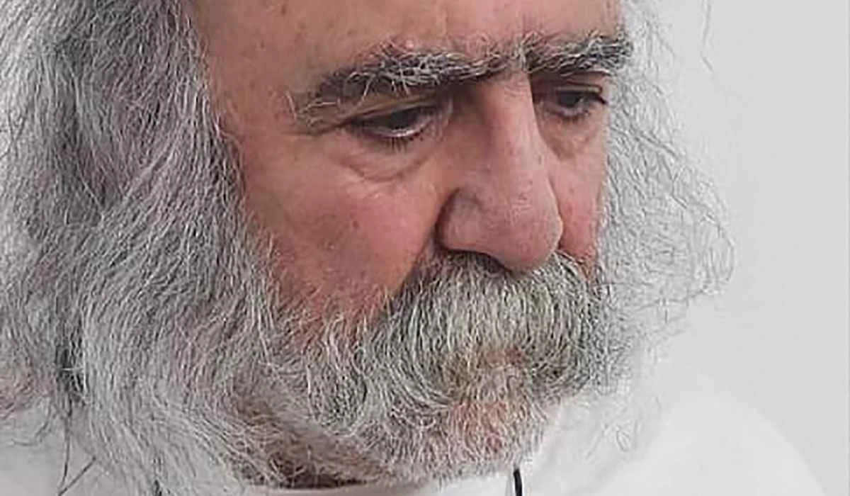 This family handout photo of Iranian dissident journalist Keyvan Samimi, 74, shows him after his release from prison on January 26, 2023 in Tehran. (AFP)