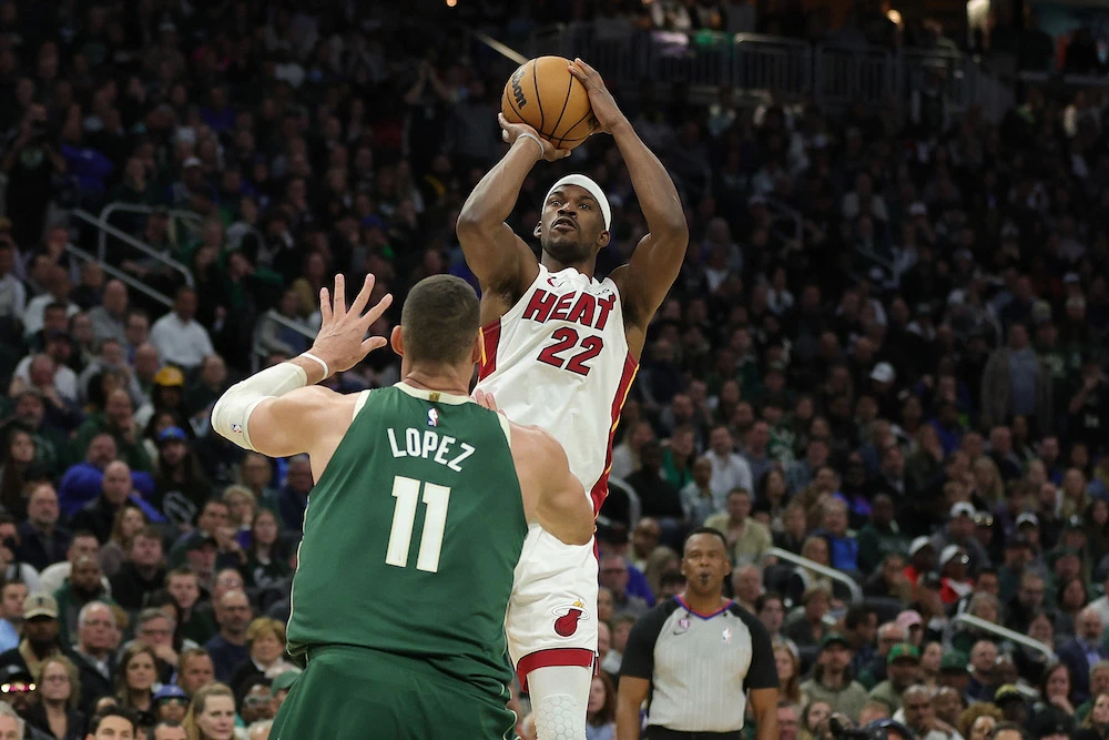 Jimmy Butler of the Miami Heat shoots over Brook Lopez of the Milwaukee Bucks during the second half of Game 5 of the Eastern Conference First Round Playoffs at Fiserv Forum on Wednesday in Milwaukee, Wisconsin. (AFP)