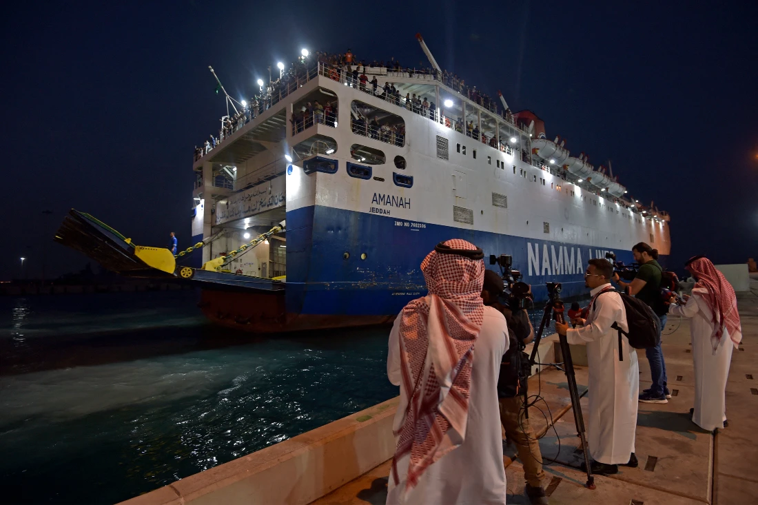 The Saudi-flagged ferry passenger ship Amanah carrying evacuated civilians fleeing violence in Sudan arrives at the King Faisal navy base in Jeddah on following a rescue operation. (AFP)