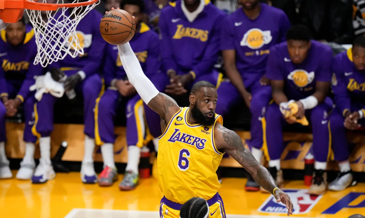 Los Angeles Lakers' LeBron James grabs a rebound during the first half in Game 6 of the team's first-round NBA basketball playoff series against the Memphis Grizzlies on Friday, April 28, 2023, in Los Angeles. (AP)