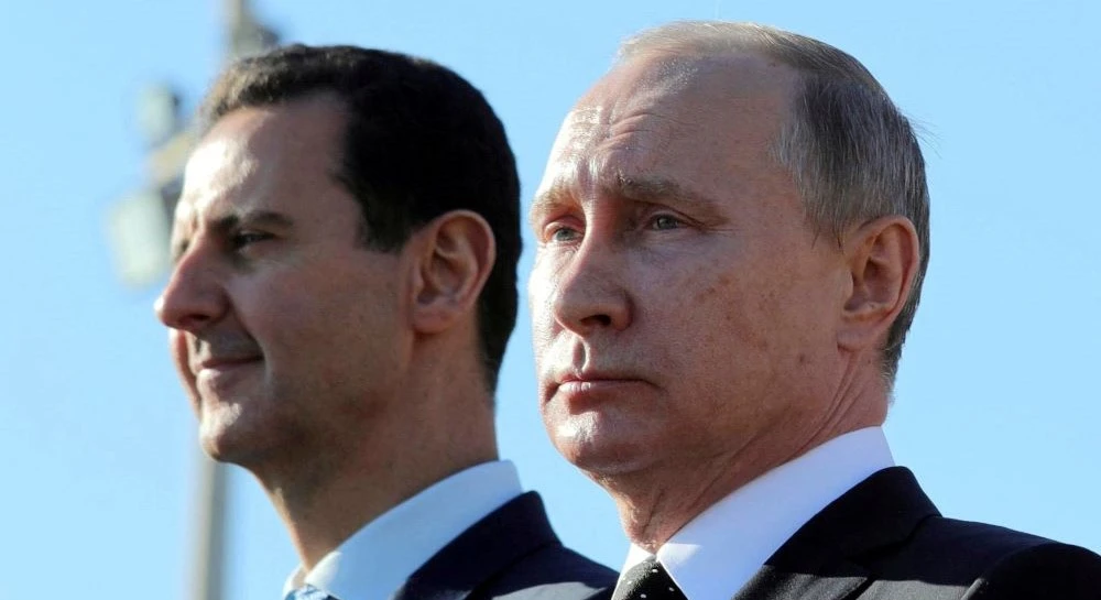 Vladimir Putin and Bashar Assad visit Hmeymim Air Base in Latakia Governorate, Syria, Dec. 11, 2017. (Reuters)