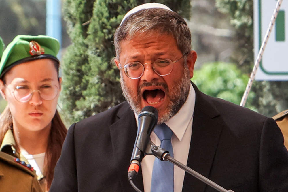 Israel's far-right National Security Minister Itamar Ben-Gvir (R) speaks in Beersheba on April 25, 2023. (AFP)