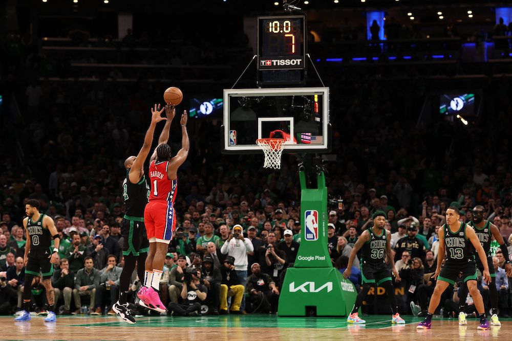 James Harden of the Philadelphia 76ers hits the game winning three-point shot past Al Horford of the Boston Celtics in Game 1 of the Eastern Conference Second Round Playoffs at TD Garden on Monday in Boston. (Getty Images North America/AFP)