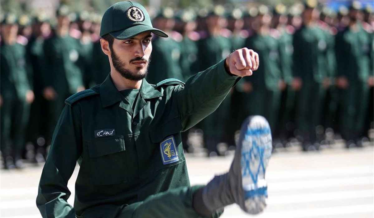 An Iranian Officer of Revolutionary Guards, with Israel flag drawn on his boots, is seen during graduation ceremony, held for the military cadets in a military academy, in Tehran, Iran June 30, 2018. (REUTERS)