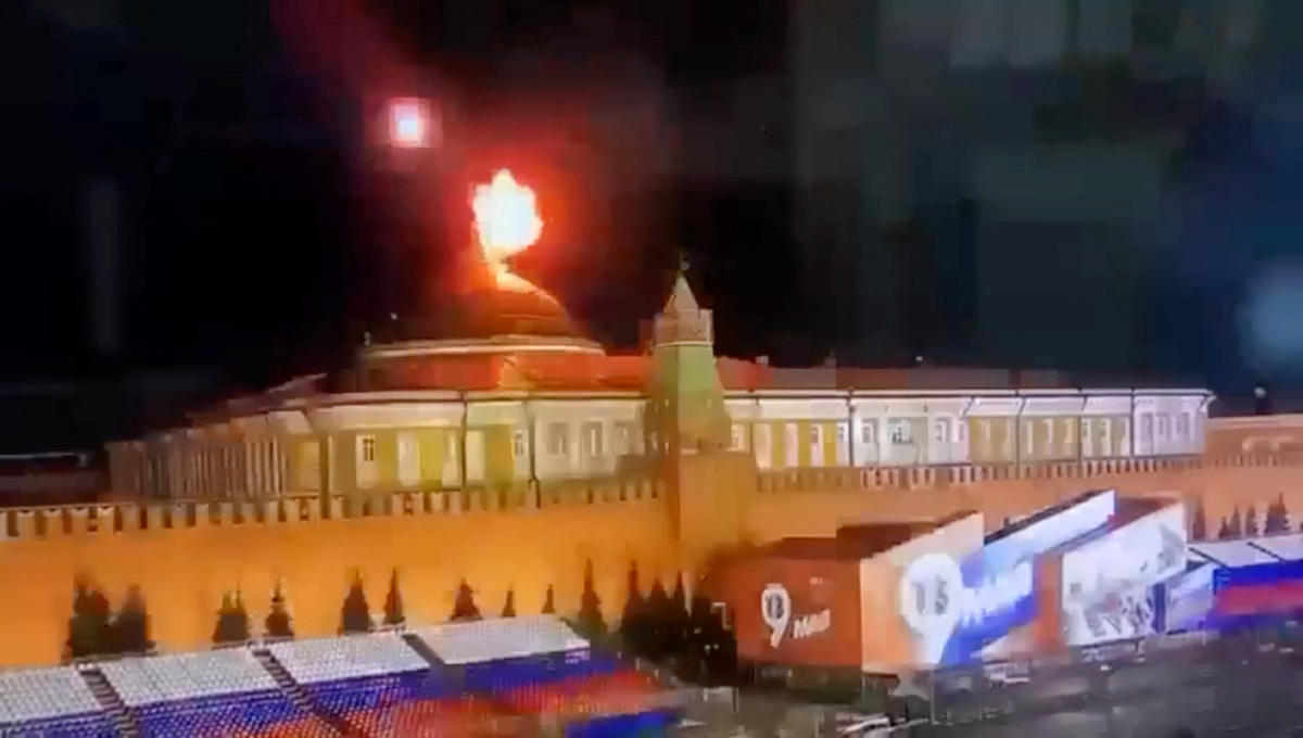 A still image taken from video shows a flying object exploding in an intense burst of light near the dome of the Kremlin Senate building during the alleged Ukrainian drone attack in Moscow in this image taken from video obtained by Reuters on May 3, 2023. (Reuters)
