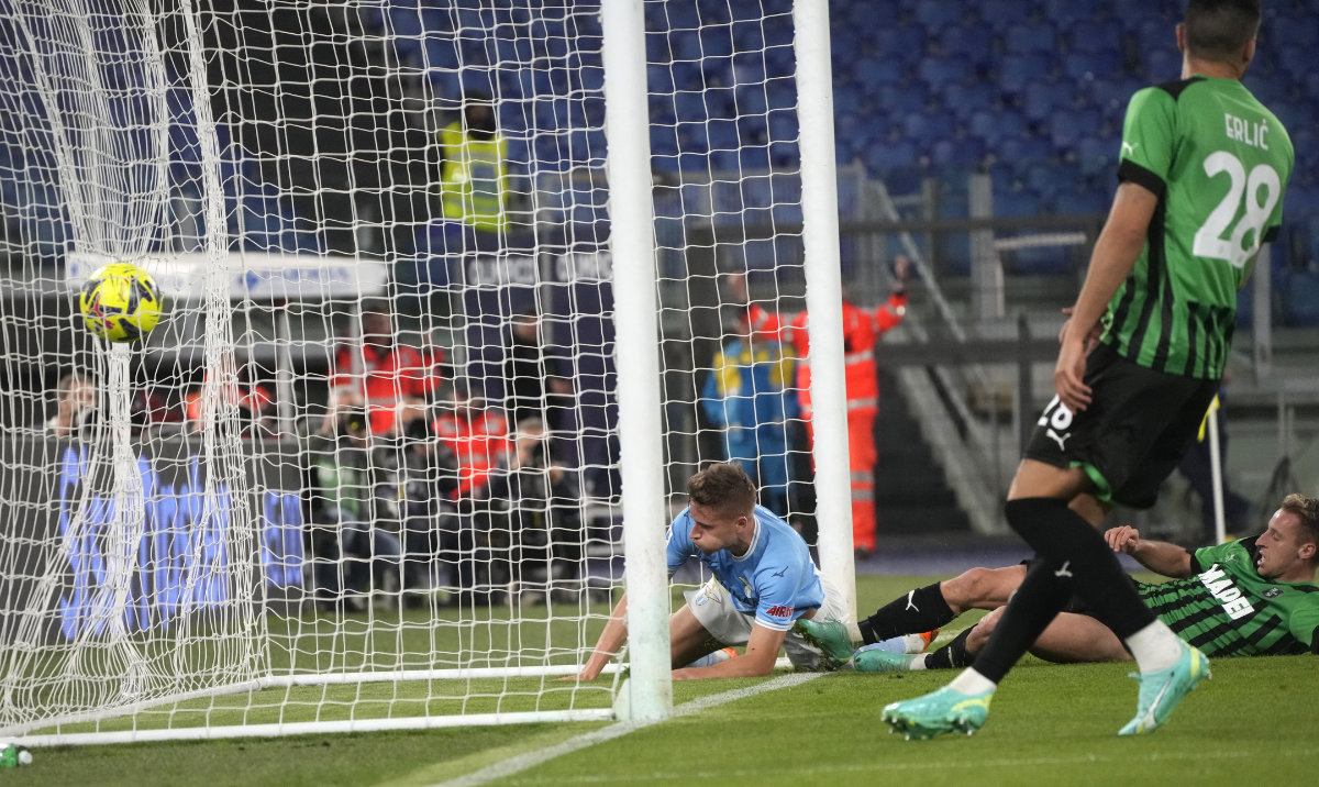 Lazio's Toma Basic, left, scores his side's second goal during a Serie A soccer match between Lazio and Sasusolo at Rome's Olympic Stadium Wednesday. (AP)