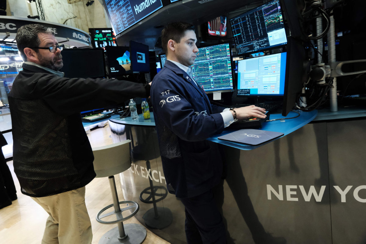 Traders work on the floor of the New York Stock Exchange (NYSE) on May 03, 2023 in New York City. US economists are warning of tumbling stocks and rise in unemployment if the government defaults on its debt payments. (Getty Images via AFP)