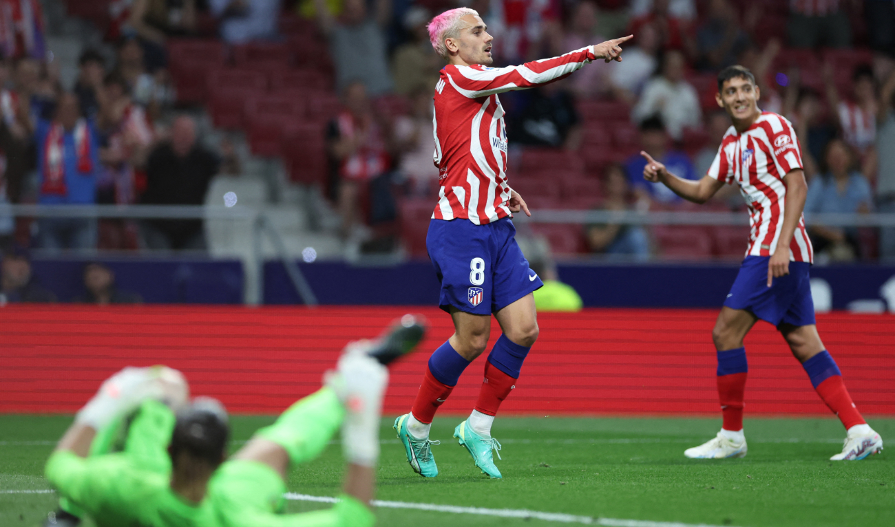 Atletico Madrid's French forward Antoine Griezmann celebrates scoring his team's second goal during the Spanish league football match between Atletico de Madrid and Cadiz CF at the Wanda Metropolitano stadium in Madrid on Wednesday. (AFP)