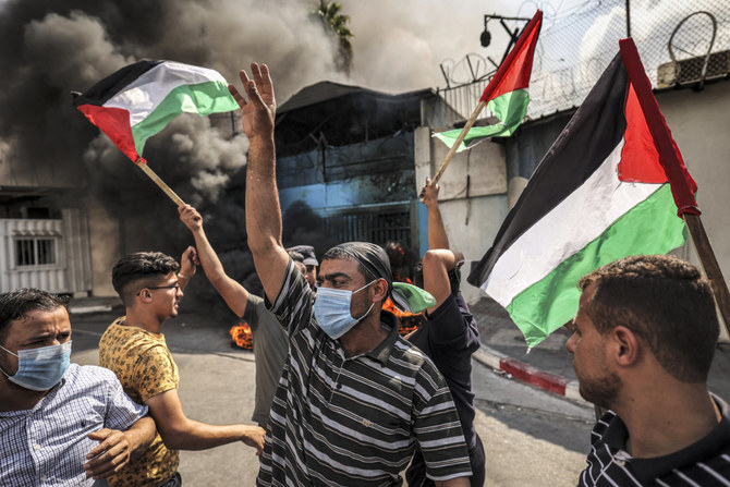 Palestinians protests against Israeli abuses outside the UNWRA office in Gaza City on September 19, 2022. (File/AFP)