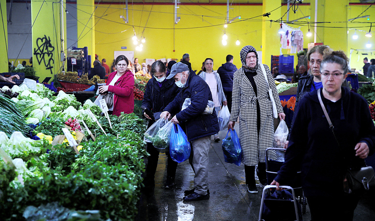 People shop at a market in Istanbul. Turks vote in Sunday’s elections seen as among the most consequential in the country’s modern history. (Reuters)