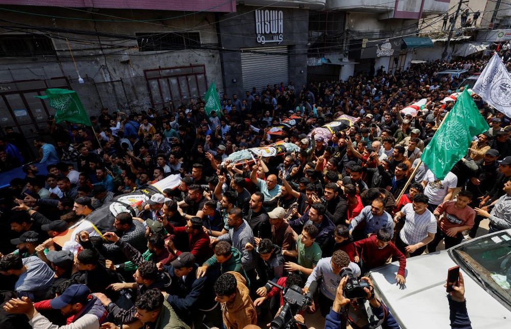 Mourners attend the funeral of Islamic Jihad commanders Tareq Izzeldeen and Khalil Al-Bahtini, and other Palestinians who were killed in Israeli strikes, Gaza City, May 9, 2023. (Reuters)