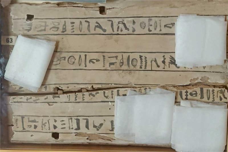 The repatriated artefacts included part of a wooden coffin lid featuring rows of hieroglyphic text. (Twitter Photo)