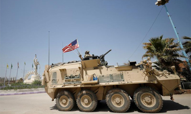 A US military vehicle travels in the town of Amuda, northern Syria. (Reuters/File)