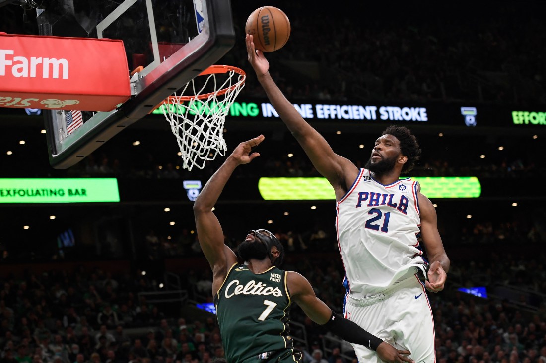 Philadelphia 76ers center Joel Embiid blocks the shot of Boston Celtics guard Jaylen Brown in the second half during Game 5 of the 2023 NBA playoffs at TD Garden on Tuesday. (USA TODAY Sports)