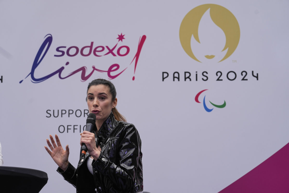 Nutritionist and sailing Olympian Helene Defrance speaks as Sodexo Live, the company tasked with serving 40,000 meals a day during the Paris 2024 Olympics, unveiled some of the items on the menu on May 9, 2023. (AP Photo/Michel Euler)