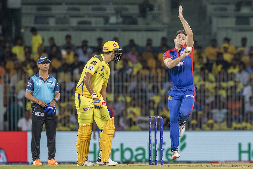Delhi Capitals’ Mitchell Marsh bowls a delivery during the Indian Premier League cricket match between Delhi Capitals and Chennai Super Kings in Chennai on May 10, 2023. (AP)