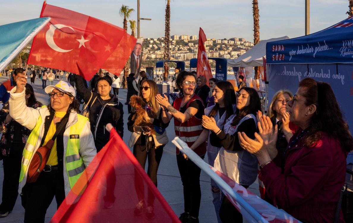 Supporters shout slogans during a campaign event ahead of the May 14 presidential and parliamentary elections in Turkiye on May 8, 2023. (Reuters)