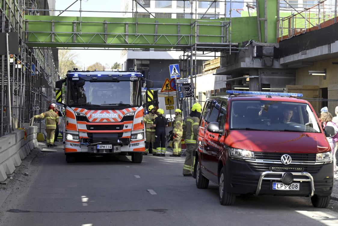 Two dozen people, many of them schoolchildren, were injured when a temporary pedestrian bridge collapsed in the southern Finnish city of Espoo on May 11, 2023. (AP)