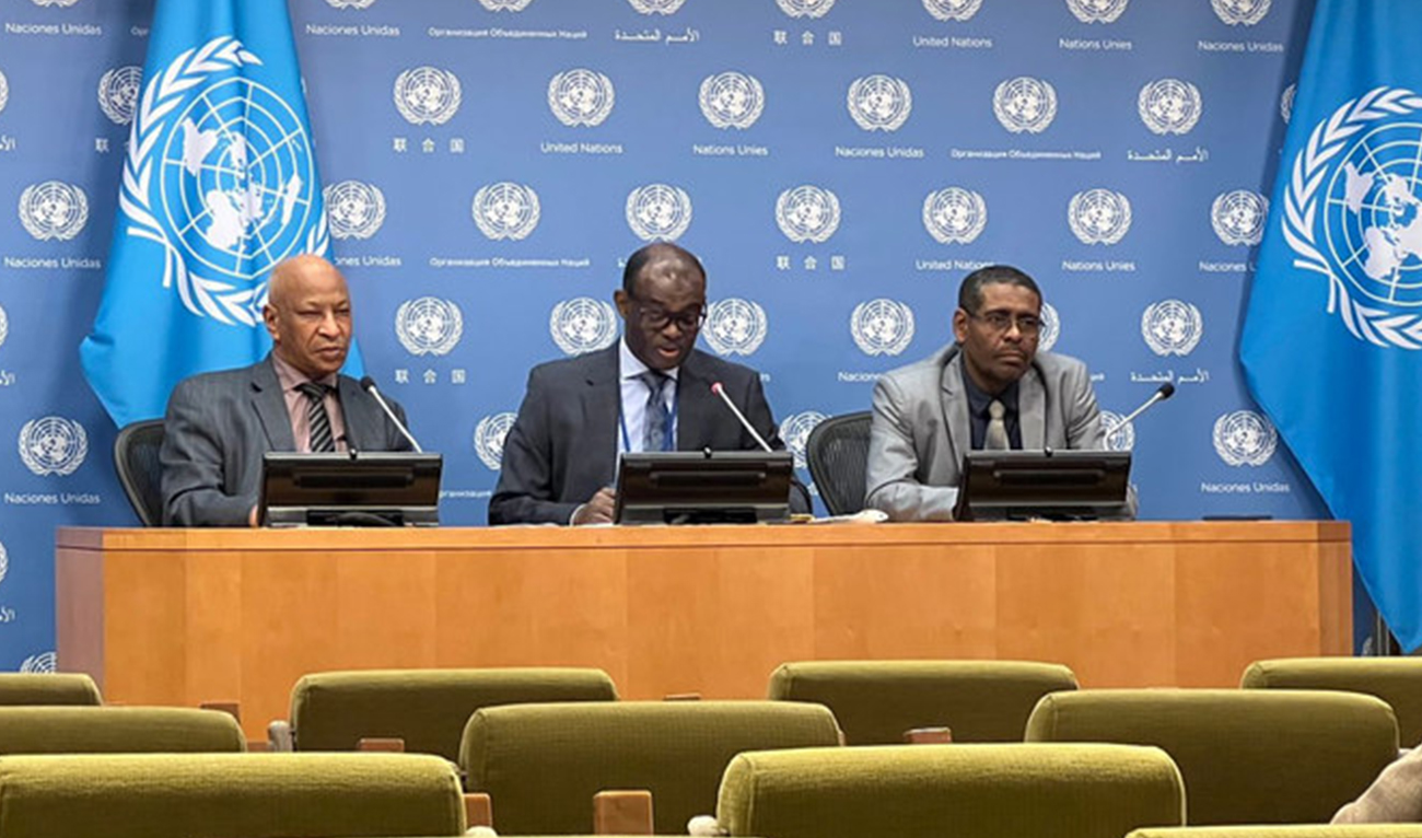 Sudan's UN envoy Al-Harith Idriss Al-Harith Mohamed (center), addresses a press conference at the United Nations headquarters on developments in Sudan on Friday. (Photo courtesy: @SudanMissionUN/Twitter)