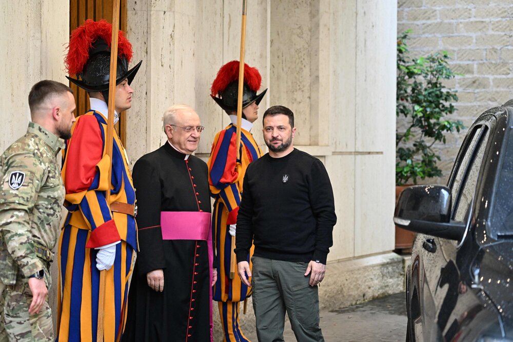 Ukrainian President Volodymyr Zelensky arrives, welcomed by Prefect of the Pontifical House, Monsignor Leonardo Sapienza, for a private audience with the Pope on May 13, 2023 in The Vatican. (AFP)