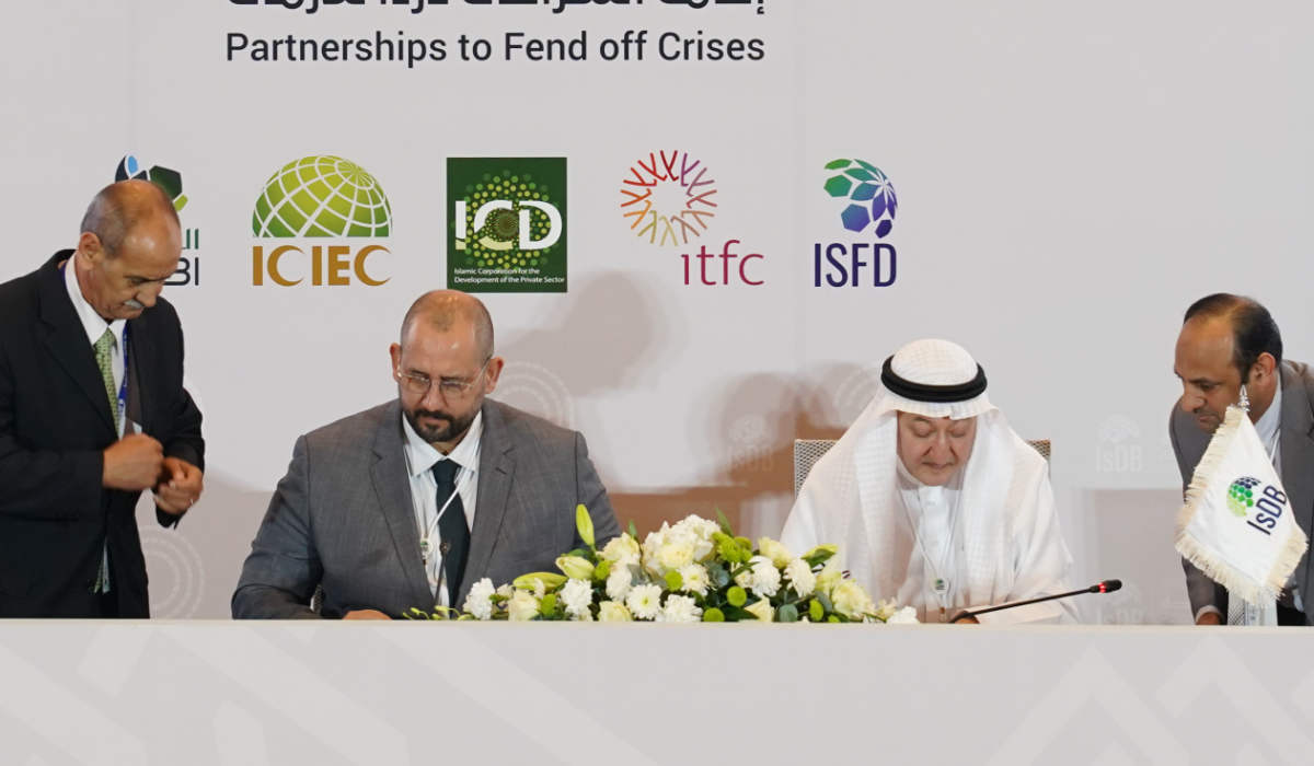 The signing of the Afghanistan Humanitarian Trust Fund included 7 humanitarian projects with IsDB, Jamal Al-Saati, special advisor to the president of IsDB right. (AN photo by Mohammed Khayat)