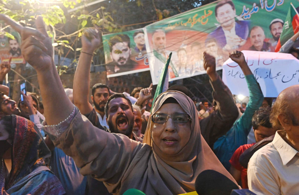 Activists of Pakistan Tehreek-e-Insaf (PTI) party of former Pakistan's Prime Minister Imran Khan, gather in support of country's judicial system at Zaman Park in Lahore on May 14, 2023. (AFP)