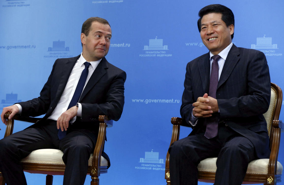 Li Hui, China's special representative for Eurasian affairs, (R) sat with Russian Prime Minister Dmitry Medvedev (L) during his time as ambassador to Moscow.(Reuters)
