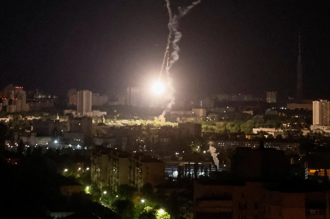 Explosion of a missile is seen in the sky over the city during a Russian missile strike, amid Russia's attack on Ukraine, in Kyiv, Ukraine. (Reuters)
