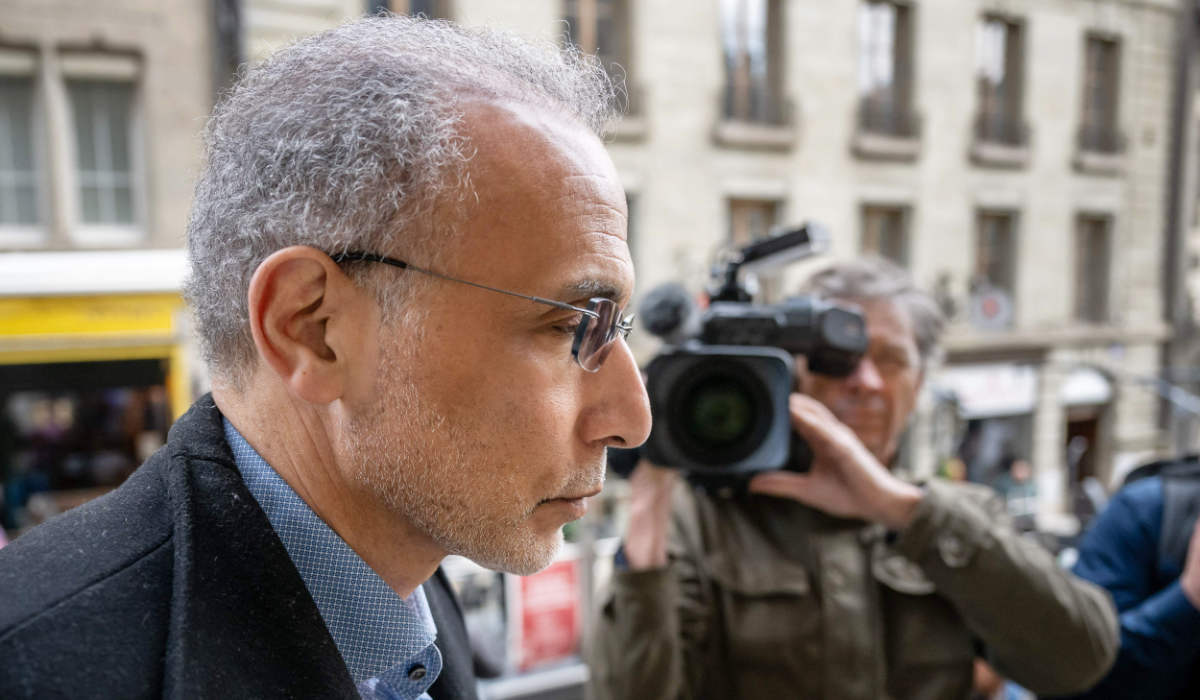 Tariq Ramadan arrives at the Geneva court house on May 15, 2023, at the opening of his trial for "rape and sexual coercion" in a case dating back 15 years. (AFP)
